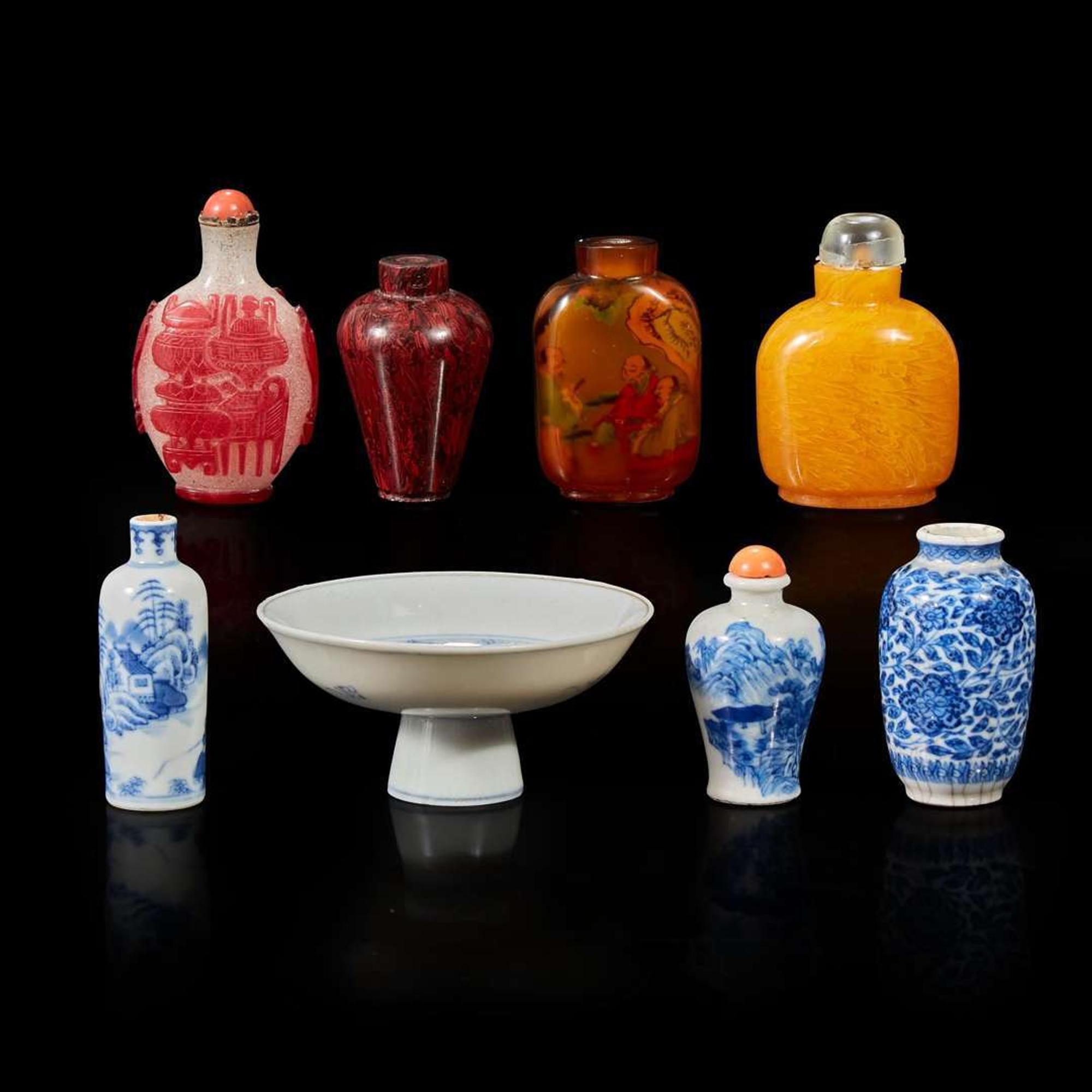 Seven assorted glass, porcelain snuff bottles; a vase; and a small blue and white porcelain tazza