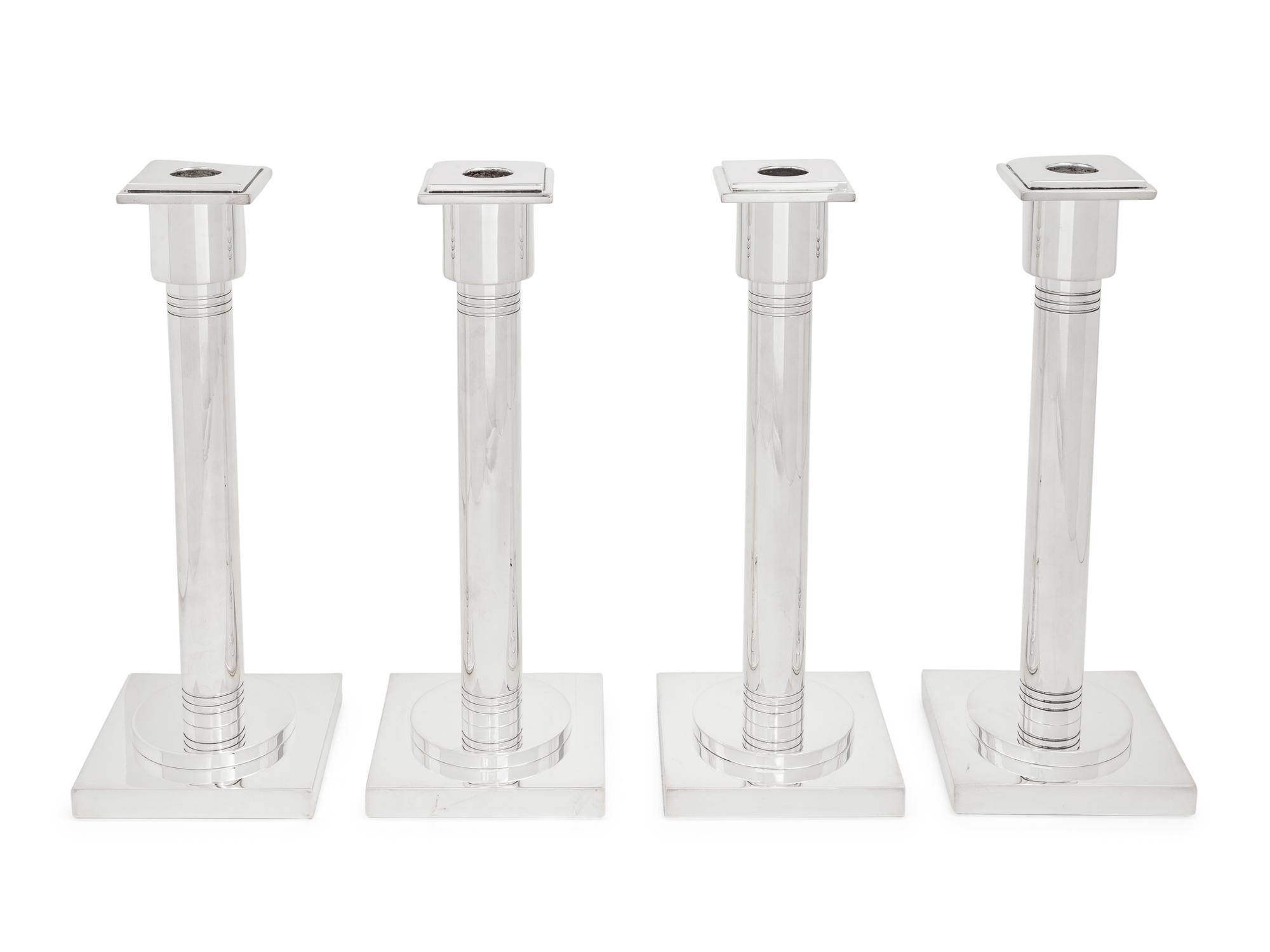 A Set of Four Art Deco Style Silver-Plate Candlesticks