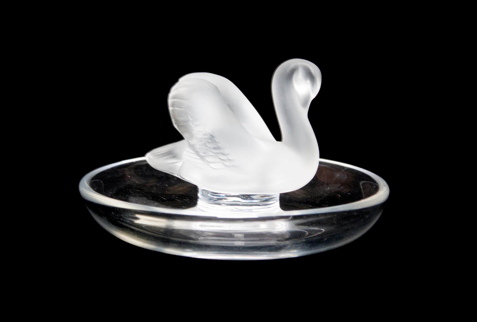 A Lalique Molded and Frosted Glass Ring Tray Height 2 x diameter 3 3/4 inches.