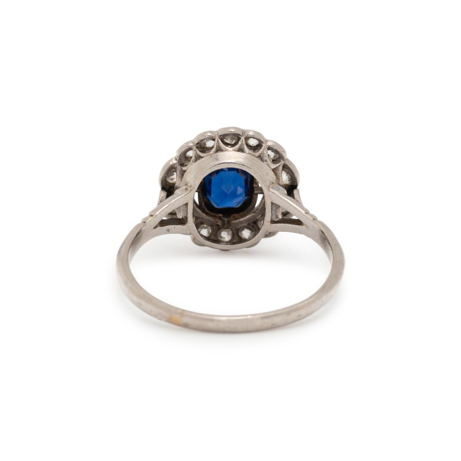 PLATINUM, SAPPHIRE AND DIAMOND RING