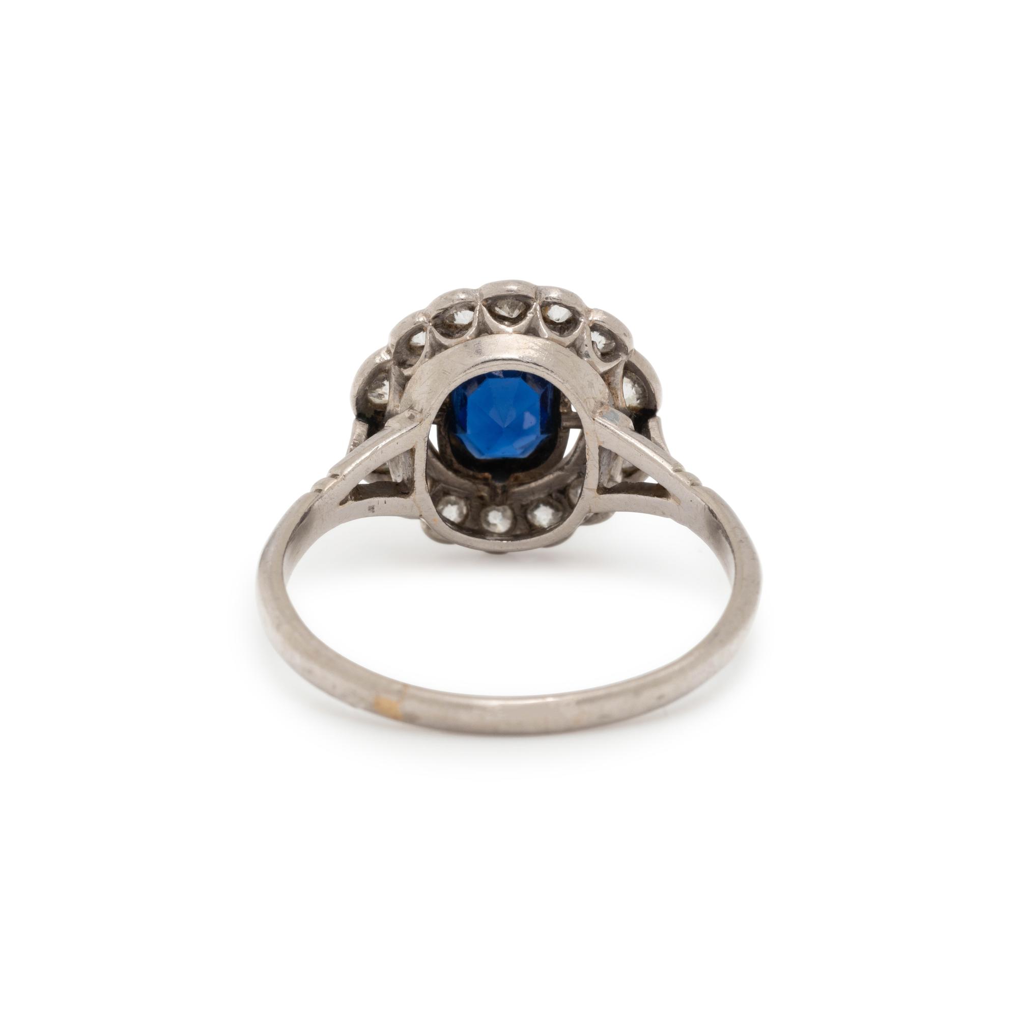 PLATINUM, SAPPHIRE AND DIAMOND RING