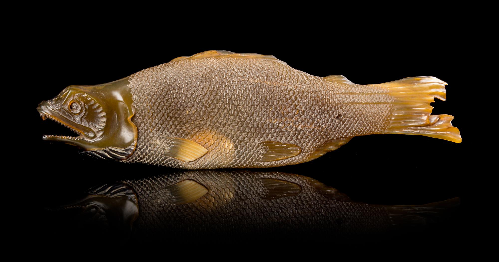 A Large Carved Horn Netsuke Length 7 inches.