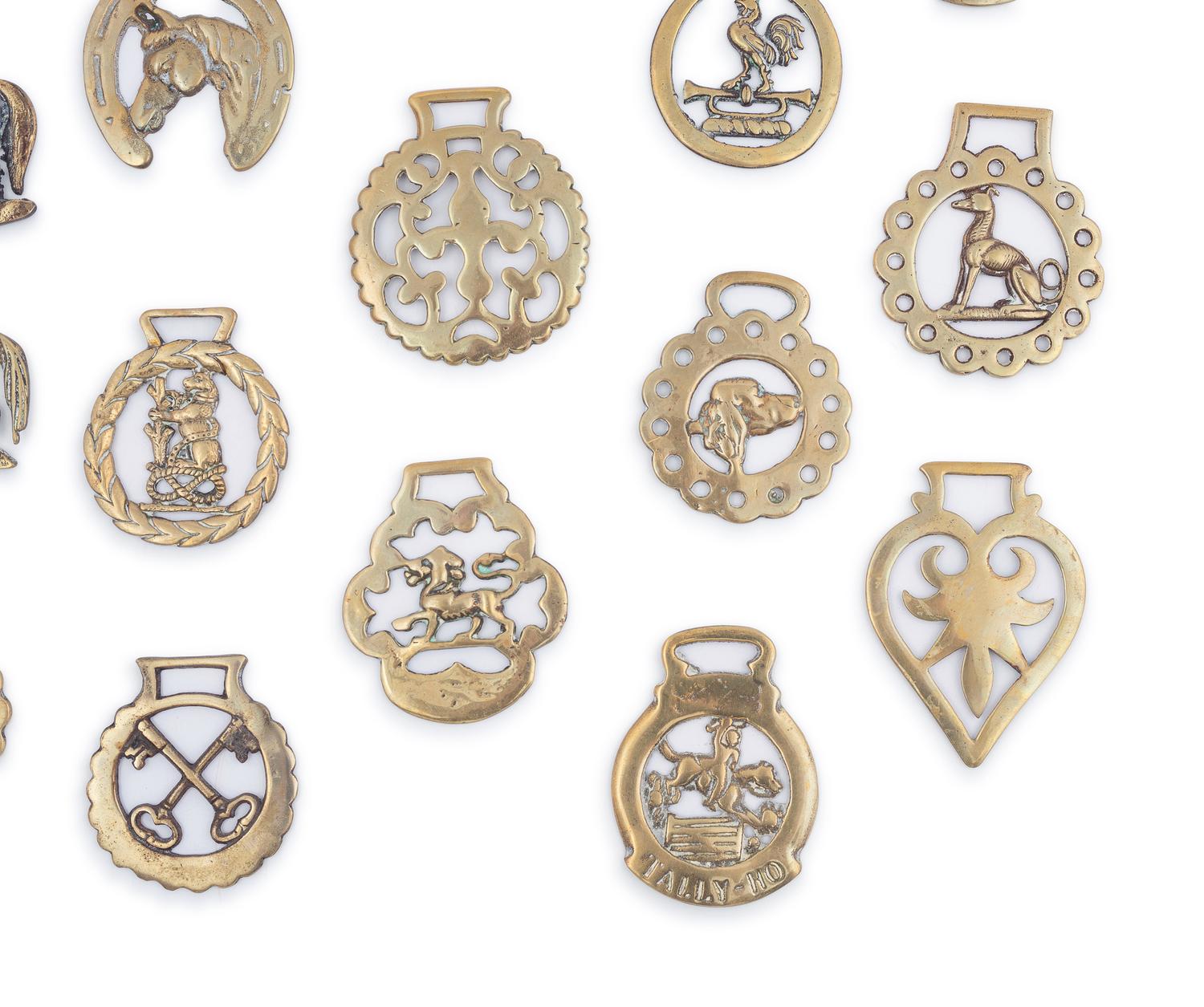 A Collection of Twenty Five Pressed and Cast Brass Buckles