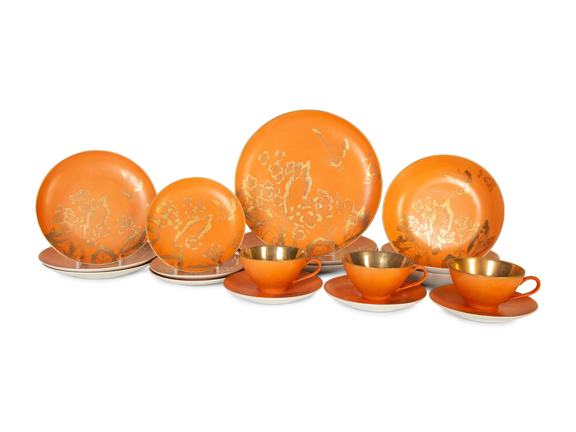A Dorothy C. Thorpe Porcelain Dinner Service in the Persimmon Pattern — 20th Century