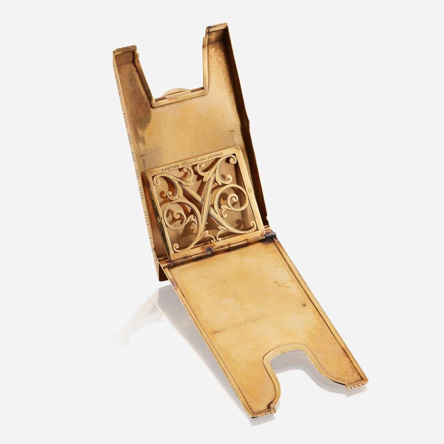 An eighteen karat gold and sapphire card case, Cartier