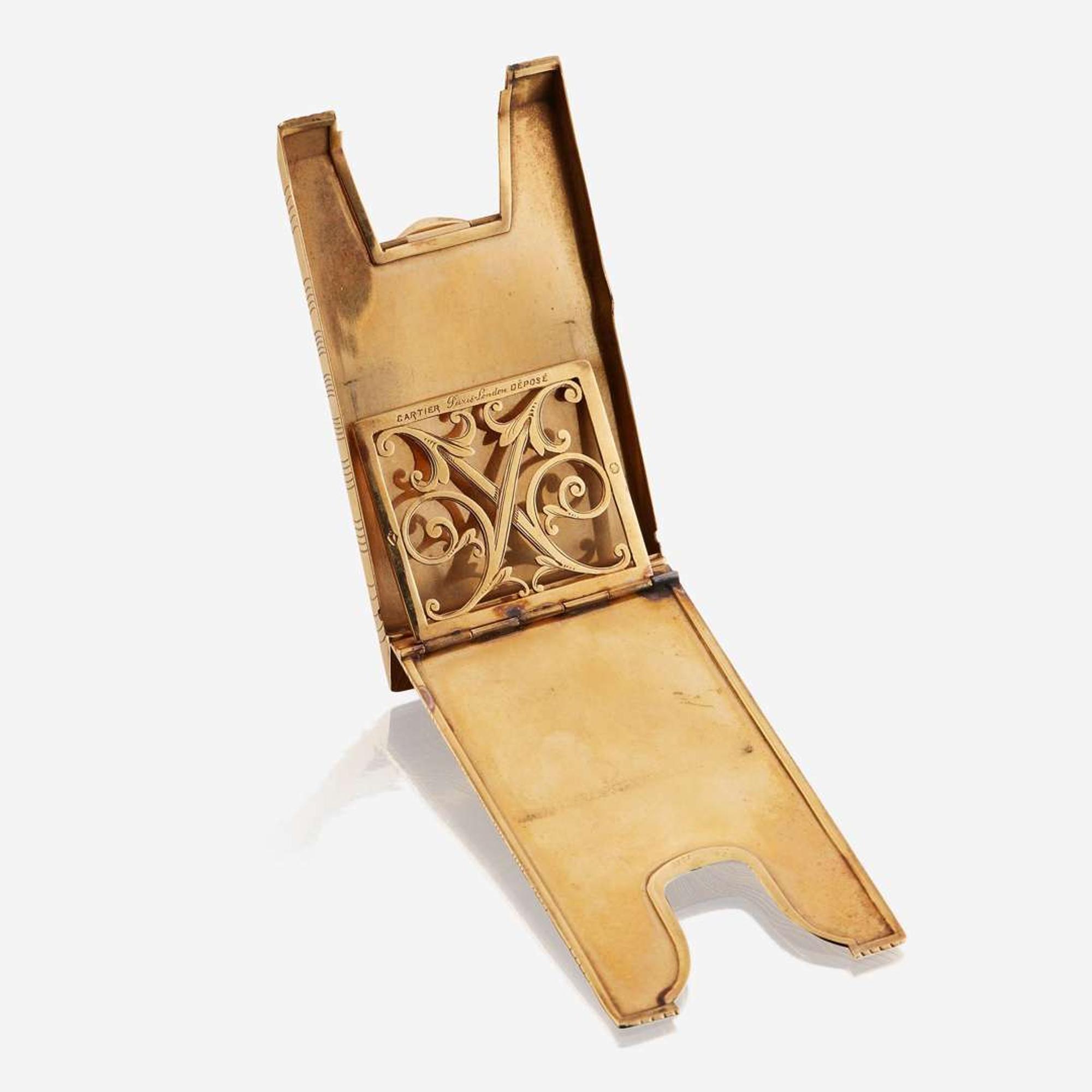 An eighteen karat gold and sapphire card case, Cartier