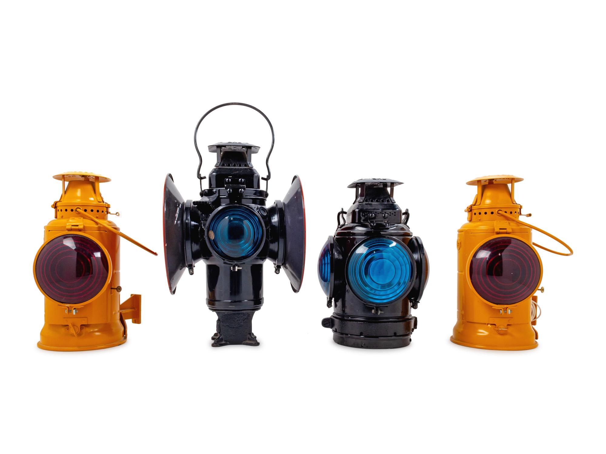A Group of Four Painted Metal Adlake: Non-Sweating Railroad Lanterns