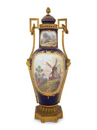 A Gilt Bronze Mounted Sèvres Style Porcelain Vase and Cover