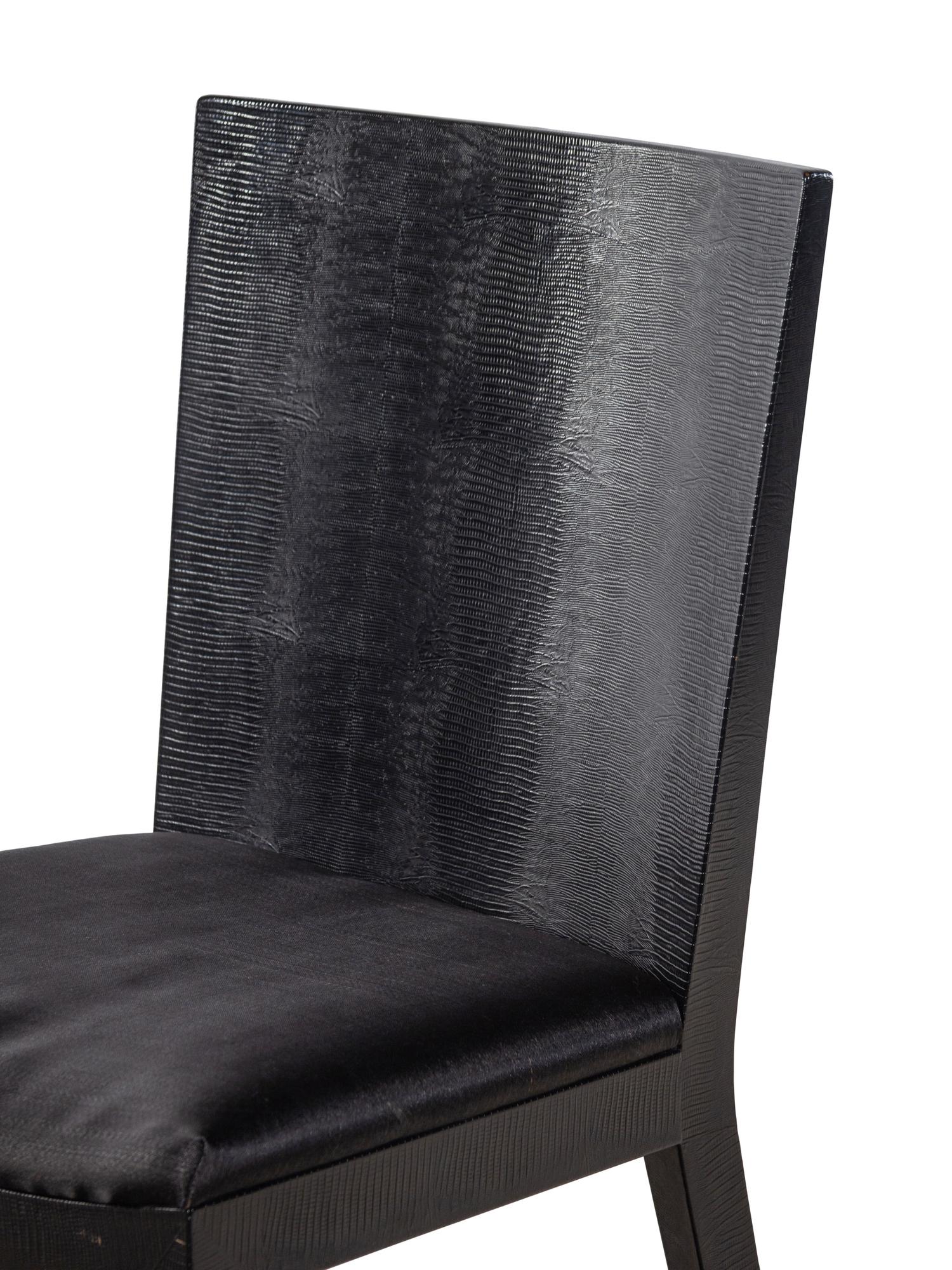 A Set of Ten Embossed Leather-Veneered Dining Chairs in the Style of Jean-Michel Frank