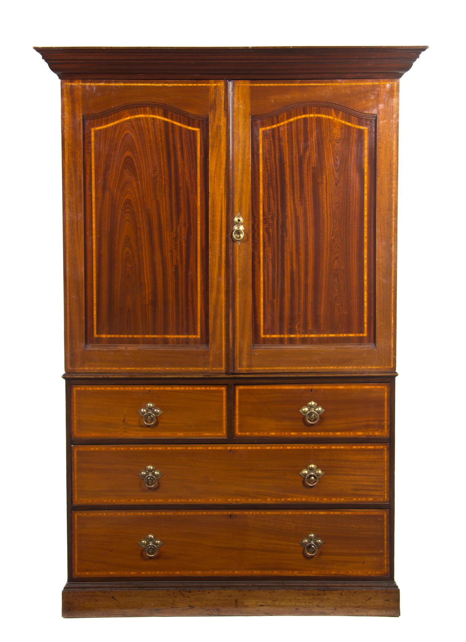 An English Mahogany Linen Press, Gillows & Co., Height 82 x width 48 x depth 19 3/8 inches.