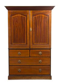 An English Mahogany Linen Press, Gillows & Co., Height 82 x width 48 x depth 19 3/8 inches.
