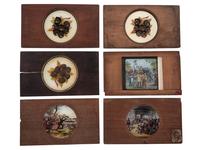 [CIVIL WAR - MAGIC LANTERN SLIDES]. A collection of magic lantern slides depicting enslaved people, Civil War battles, and caricatures, including: