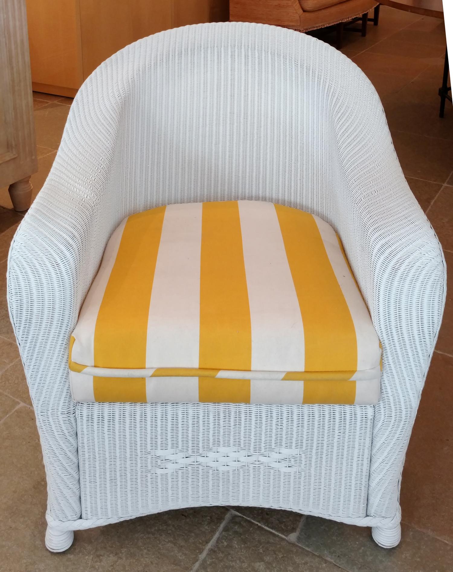 A White Painted Wicker Armchair Height 34 1/2 inches.
