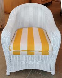 A White Painted Wicker Armchair Height 34 1/2 inches.