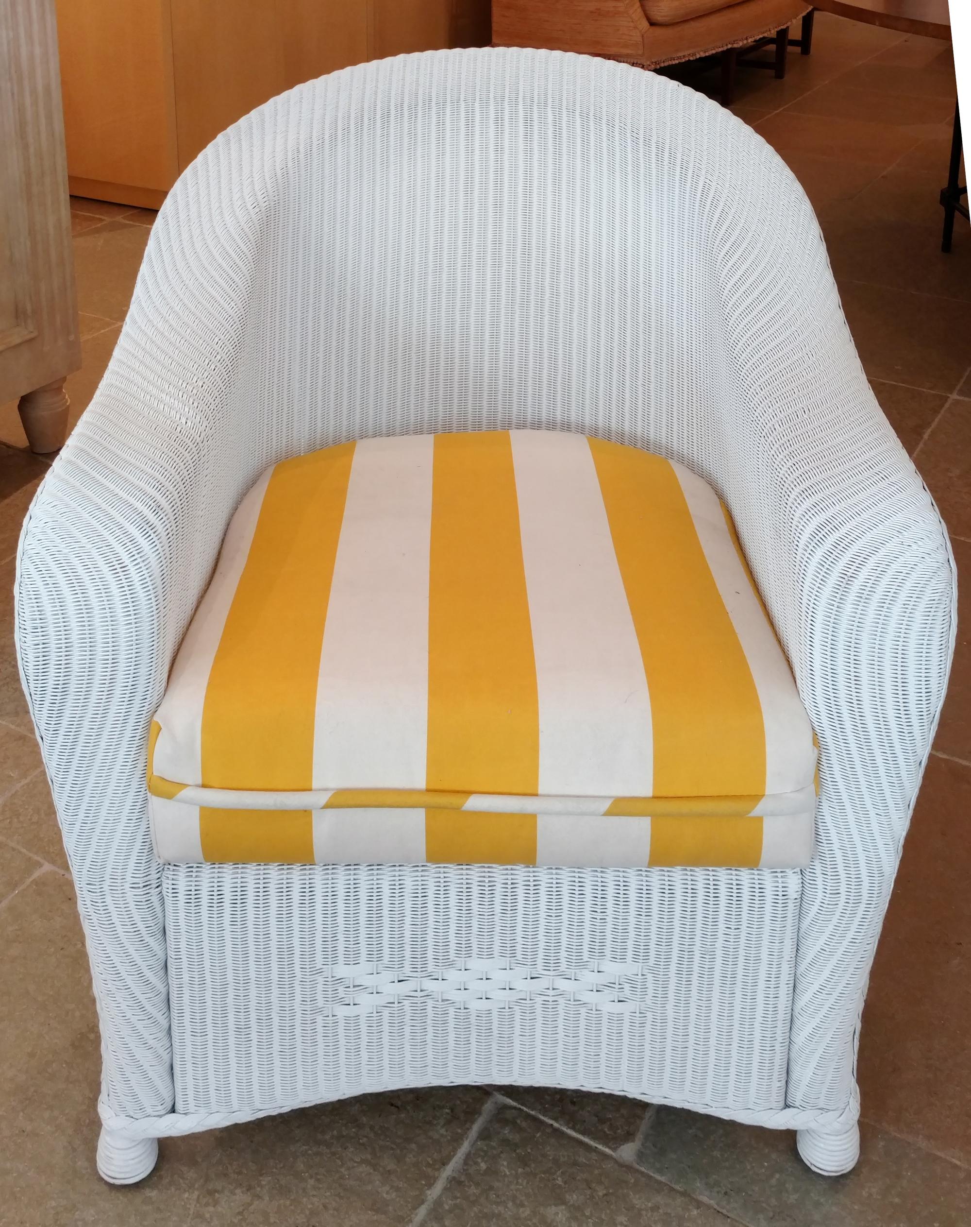 A White Painted Wicker Armchair Height 34 1/2 inches.