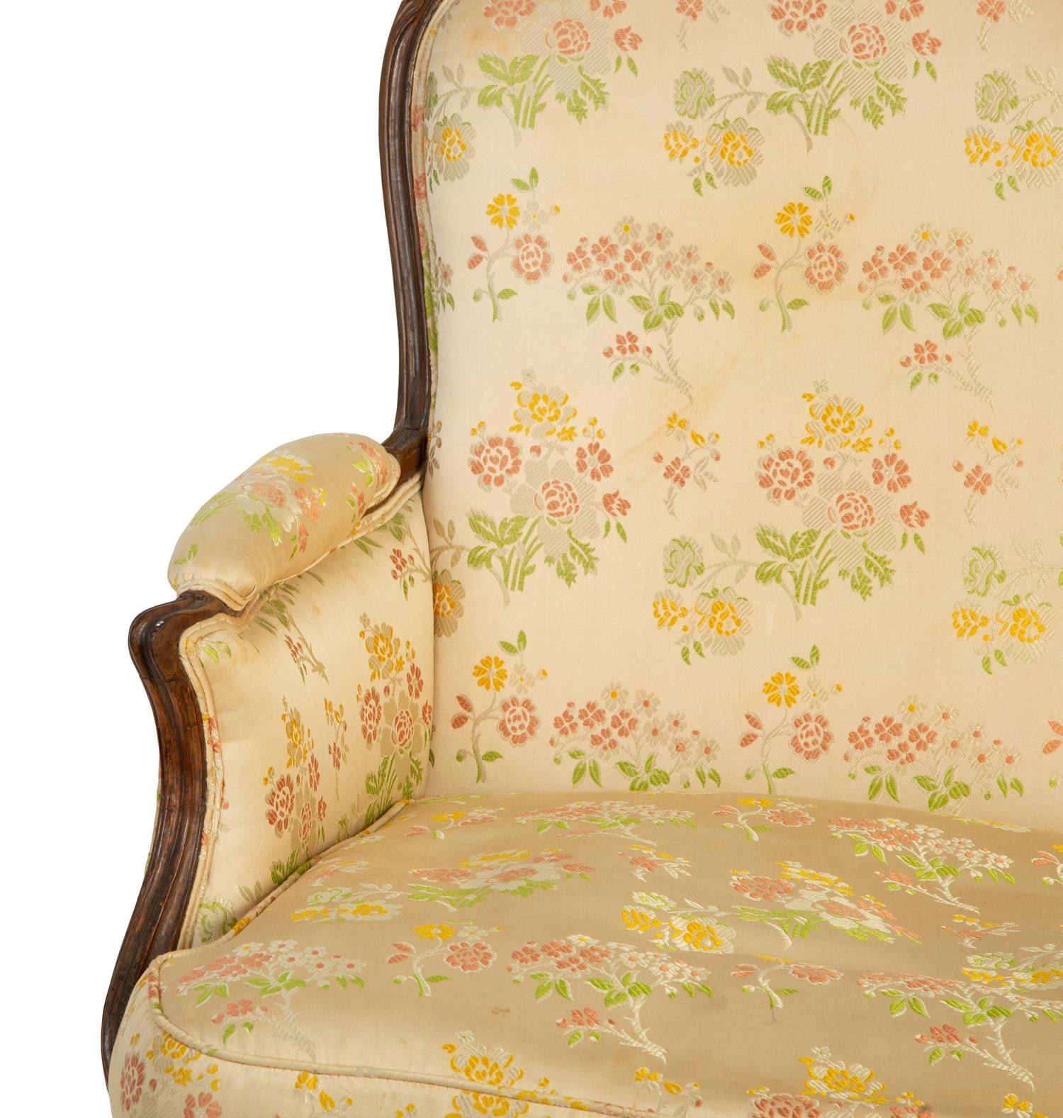 A Louis XV Carved Beechwood Bergere a La Reine — MID 18TH-CENTURY