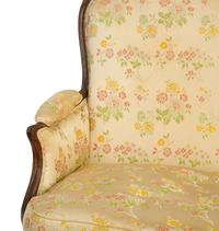 A Louis XV Carved Beechwood Bergere a La Reine — MID 18TH-CENTURY
