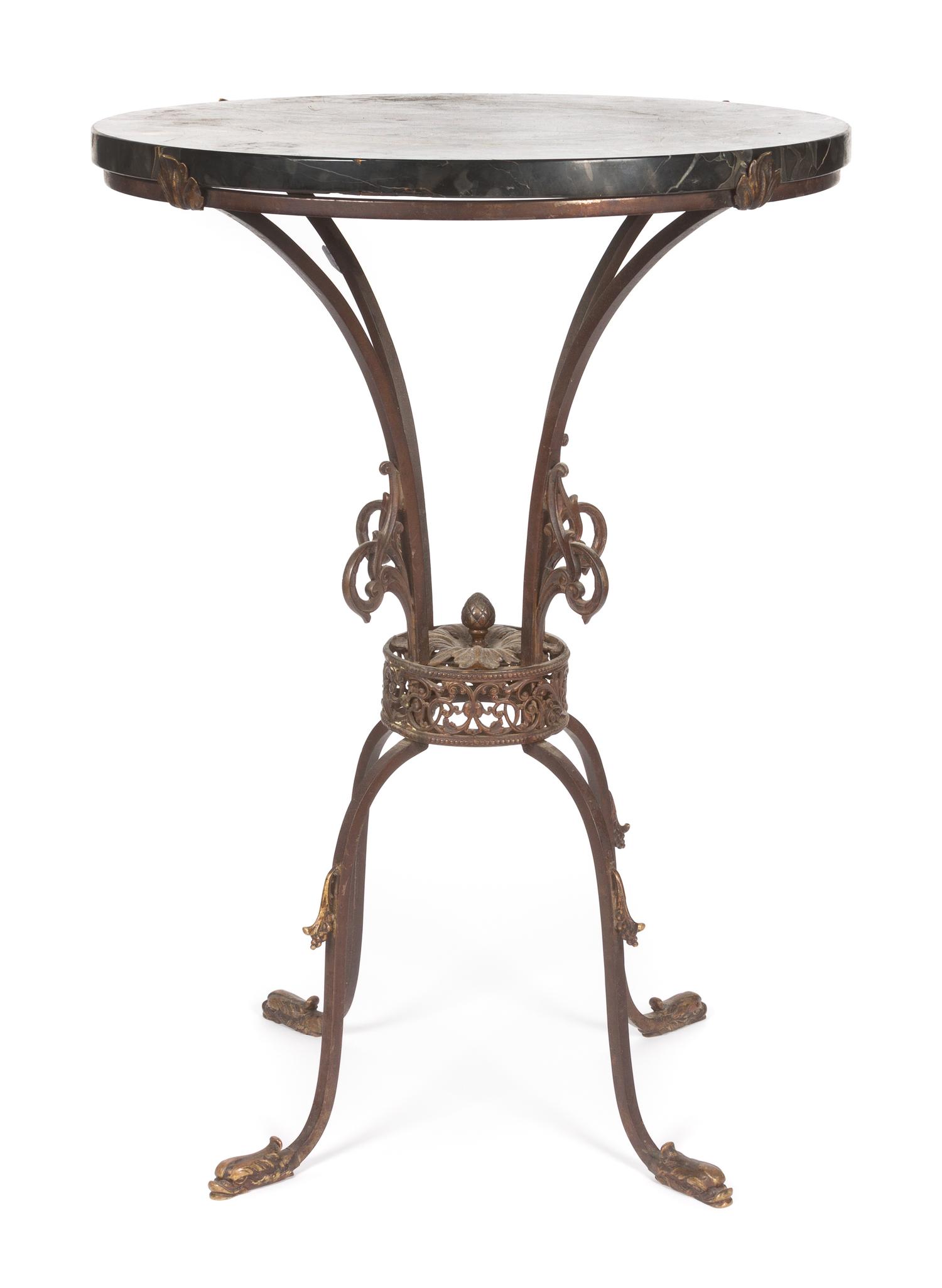 A Neoclassical Iron and Marble Occasional Table Height 28 x diameter 20 inches.