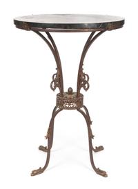 A Neoclassical Iron and Marble Occasional Table Height 28 x diameter 20 inches.