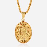 A Yellow Gold Peruvian Pendant and Chain