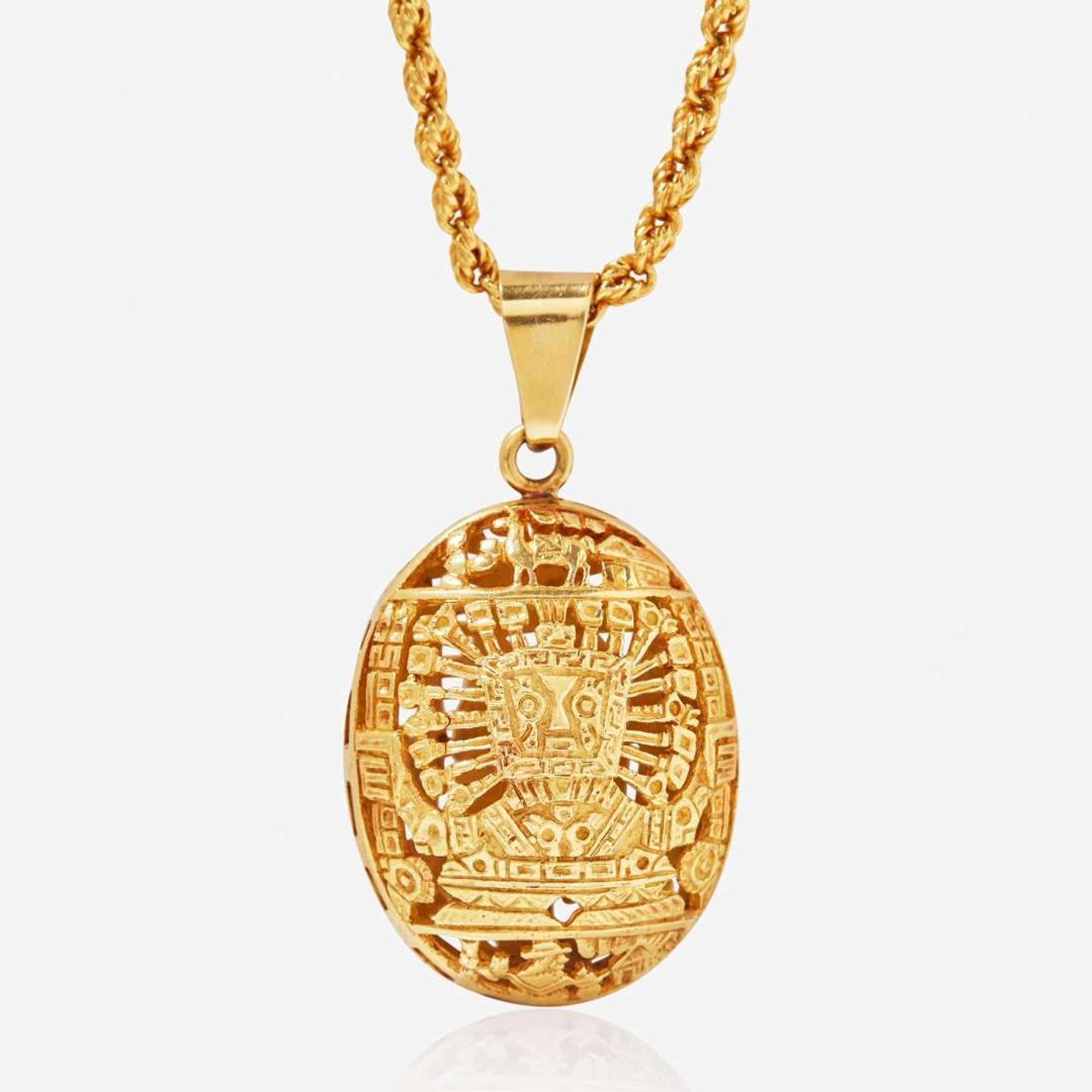 A Yellow Gold Peruvian Pendant and Chain
