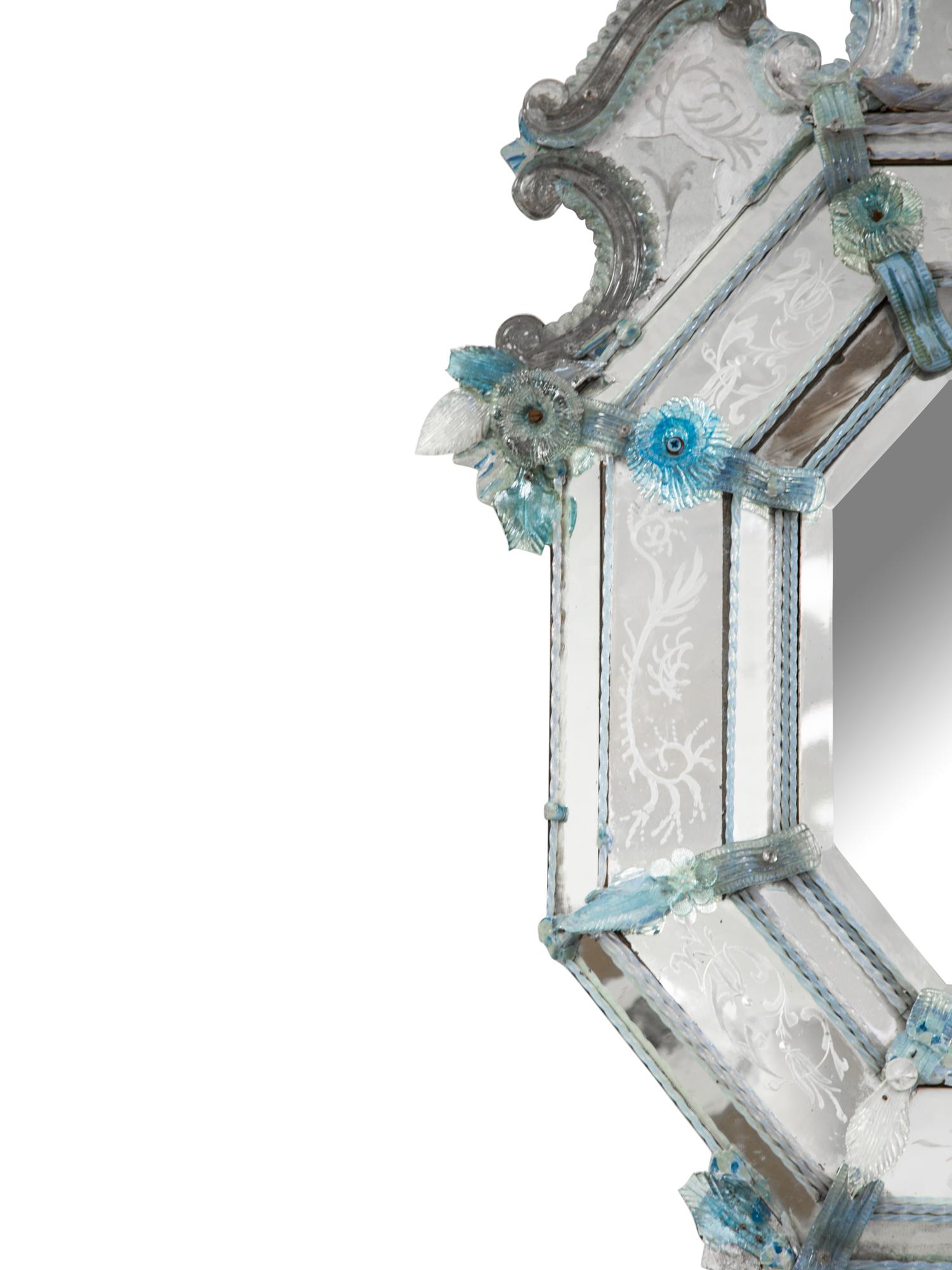 A Venetian Etched Glass and Pale Blue Glass Accented Mirror