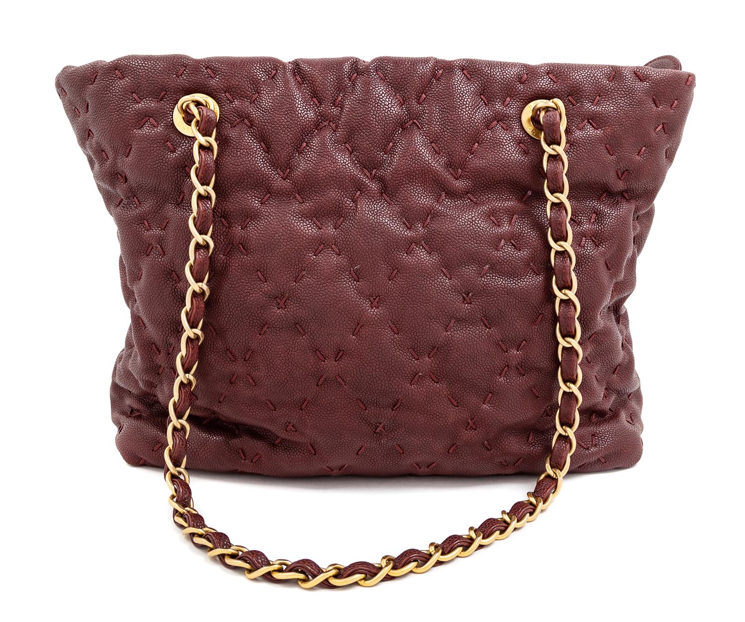 A Chanel Burgundy Caviar Quilted Wild Stitch Tote, 10.5" H x 12.5" W x 5" D; Strap drop: