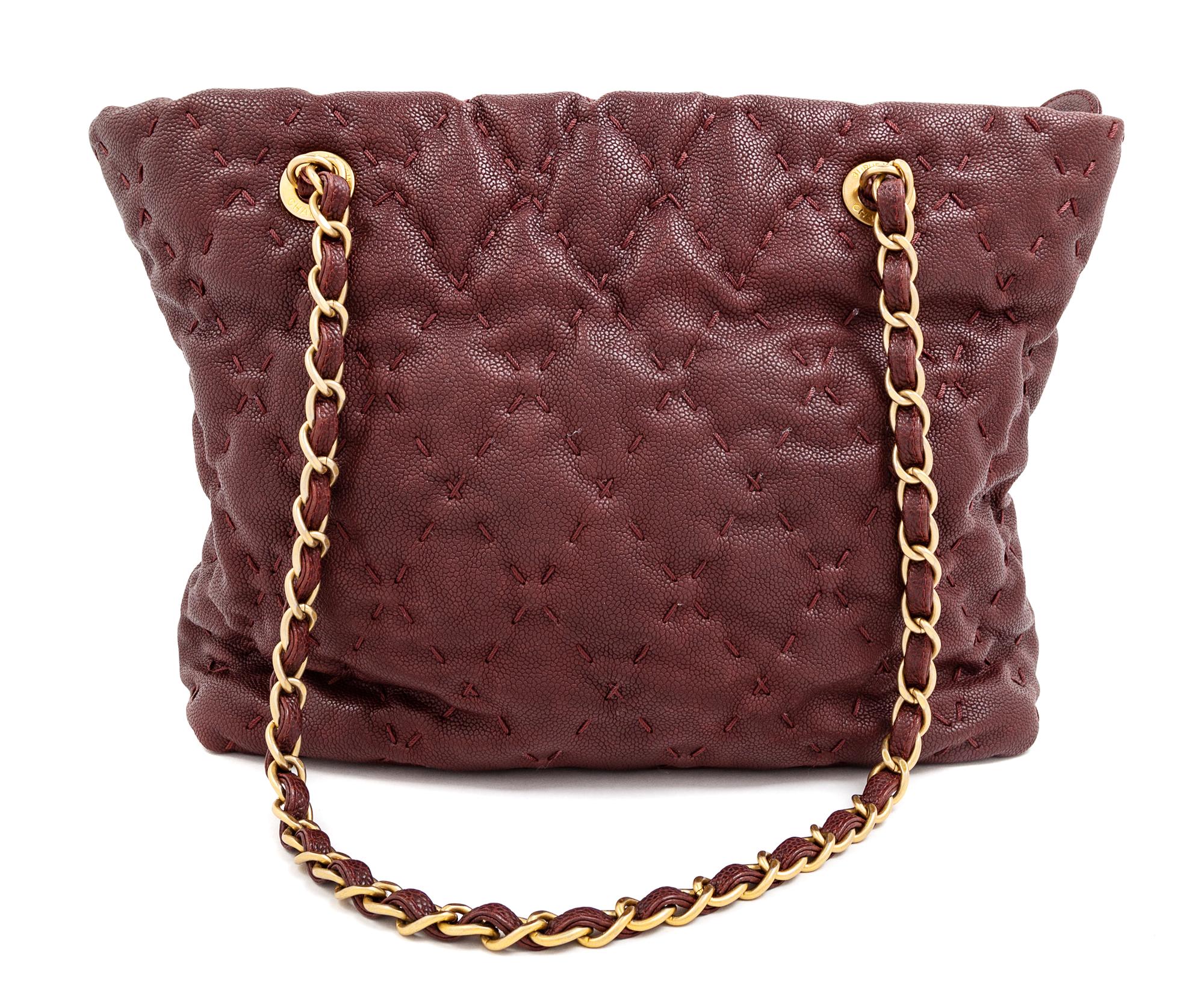 A Chanel Burgundy Caviar Quilted Wild Stitch Tote, 10.5" H x 12.5" W x 5" D; Strap drop: