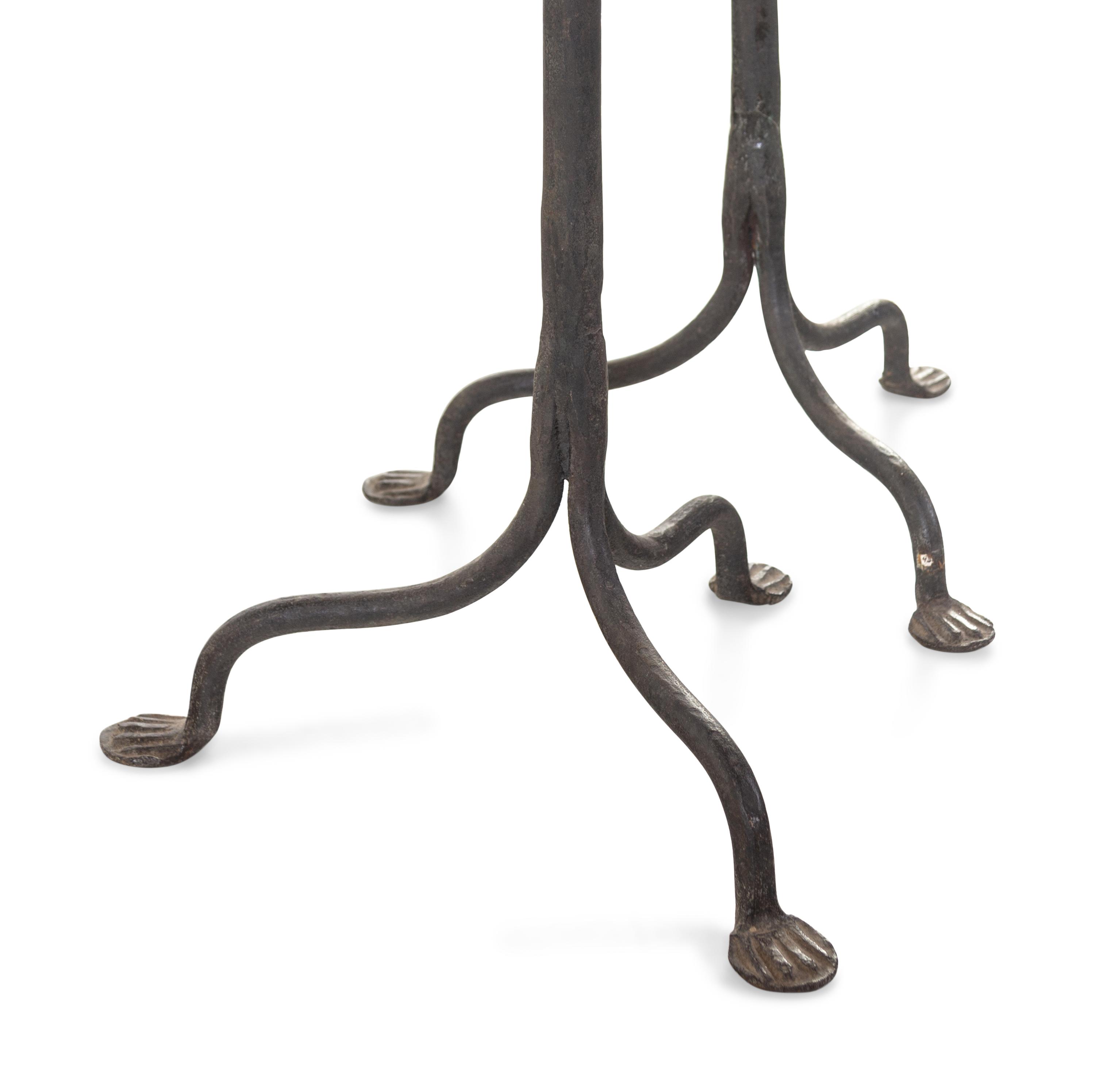 A Pair of Spanish Wrought Iron Floor Candlesticks