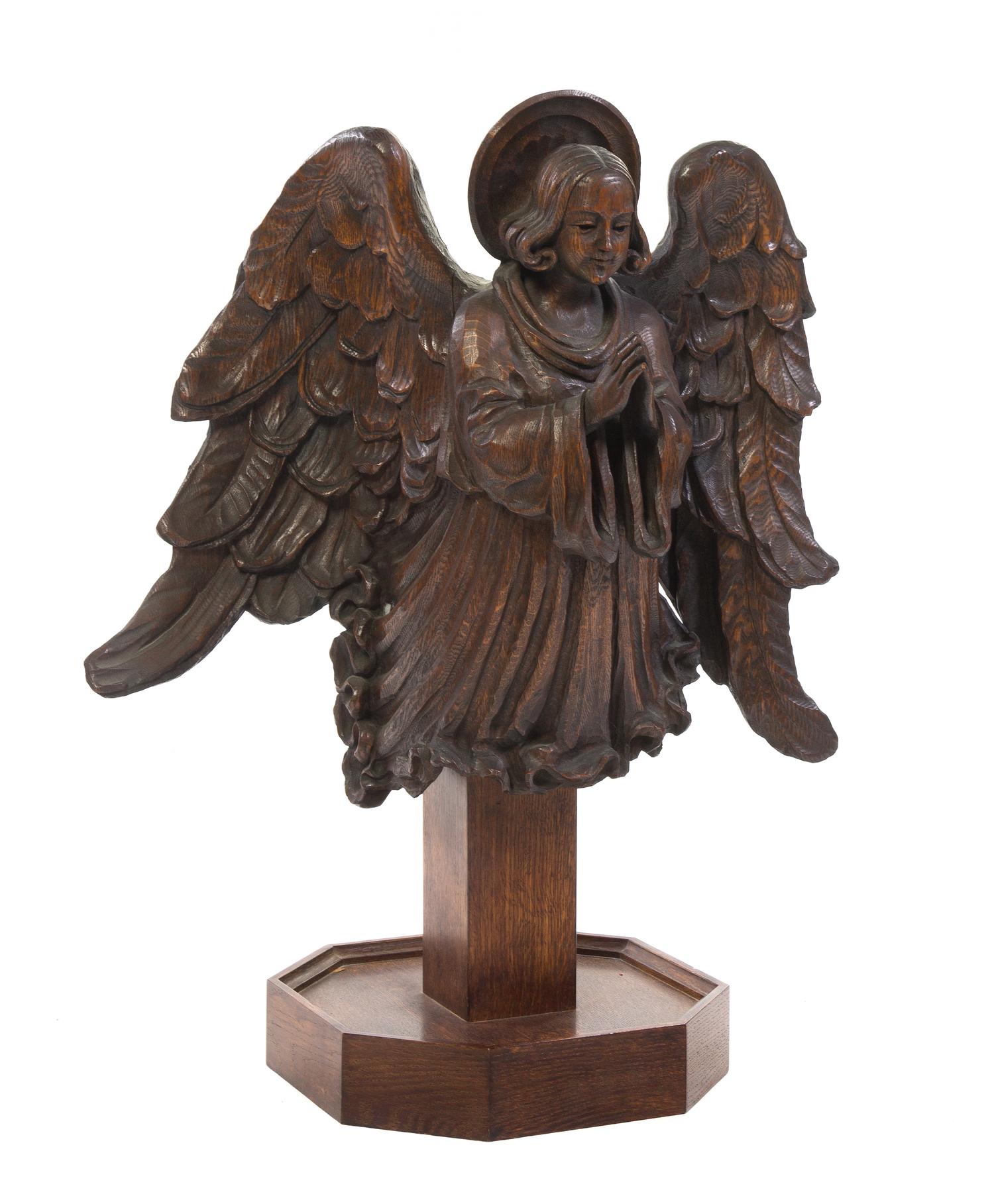 A Carved Oak Figure, Height overall 33 inches.
