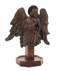 A Carved Oak Figure, Height overall 33 inches.