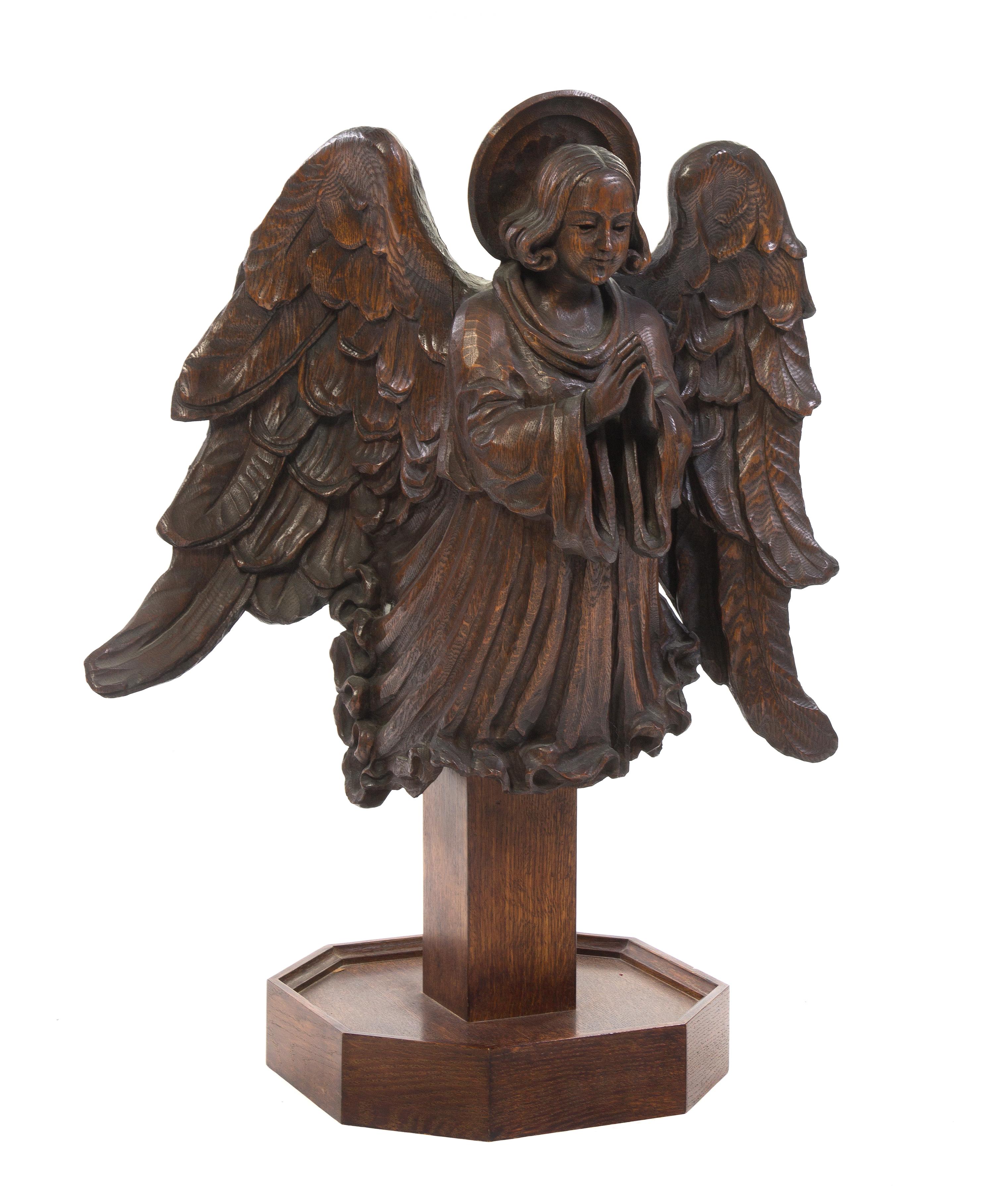 A Carved Oak Figure, Height overall 33 inches.