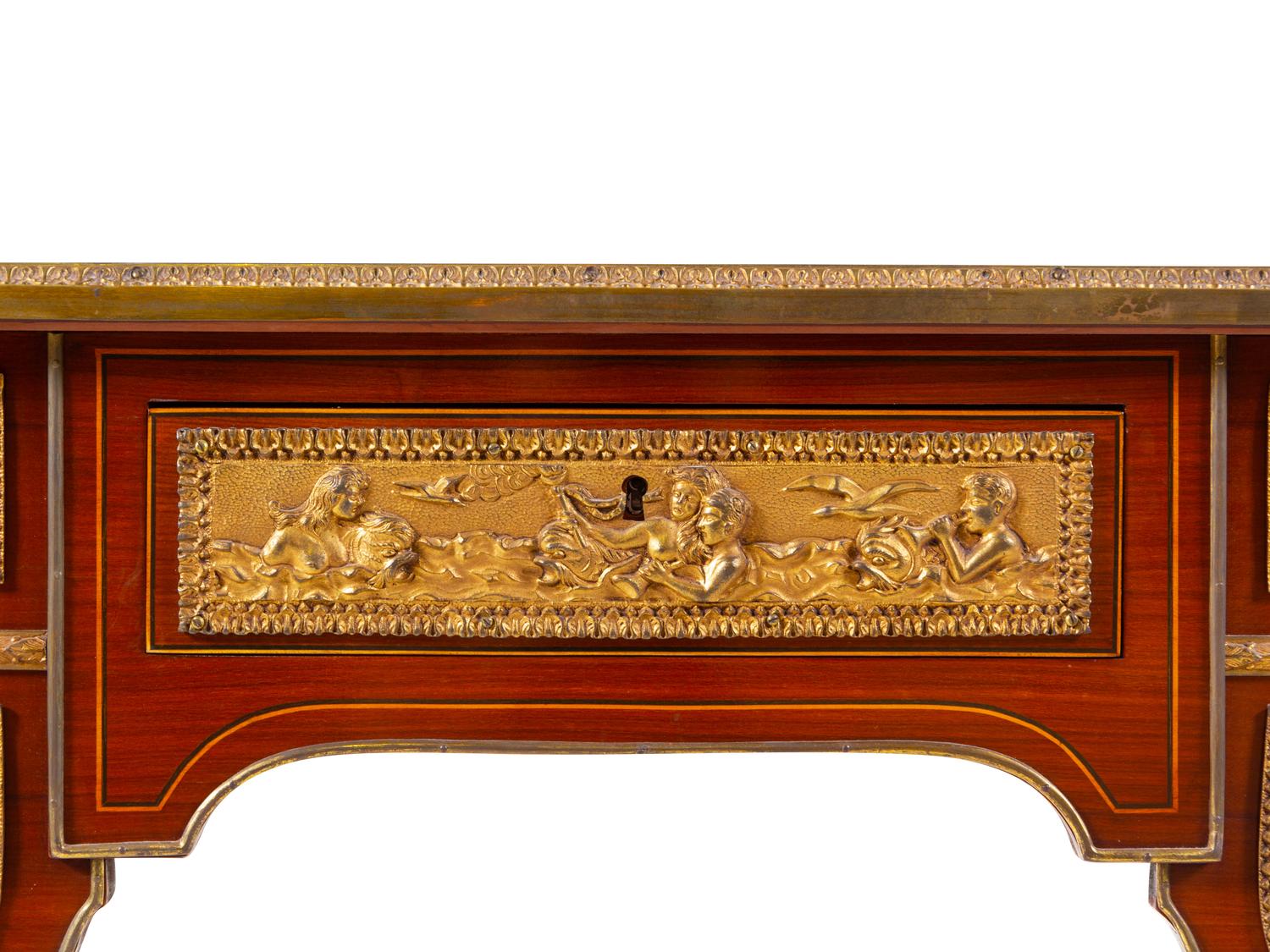 A Louis XVI Style Gilt Bronze Mounted Parquetry Bureau Plat