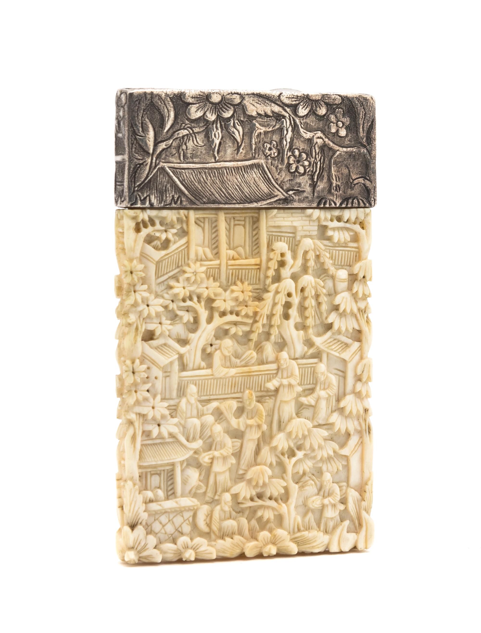 An Asian Ivory and Silver Card Case, Height 3 3/4 inches.