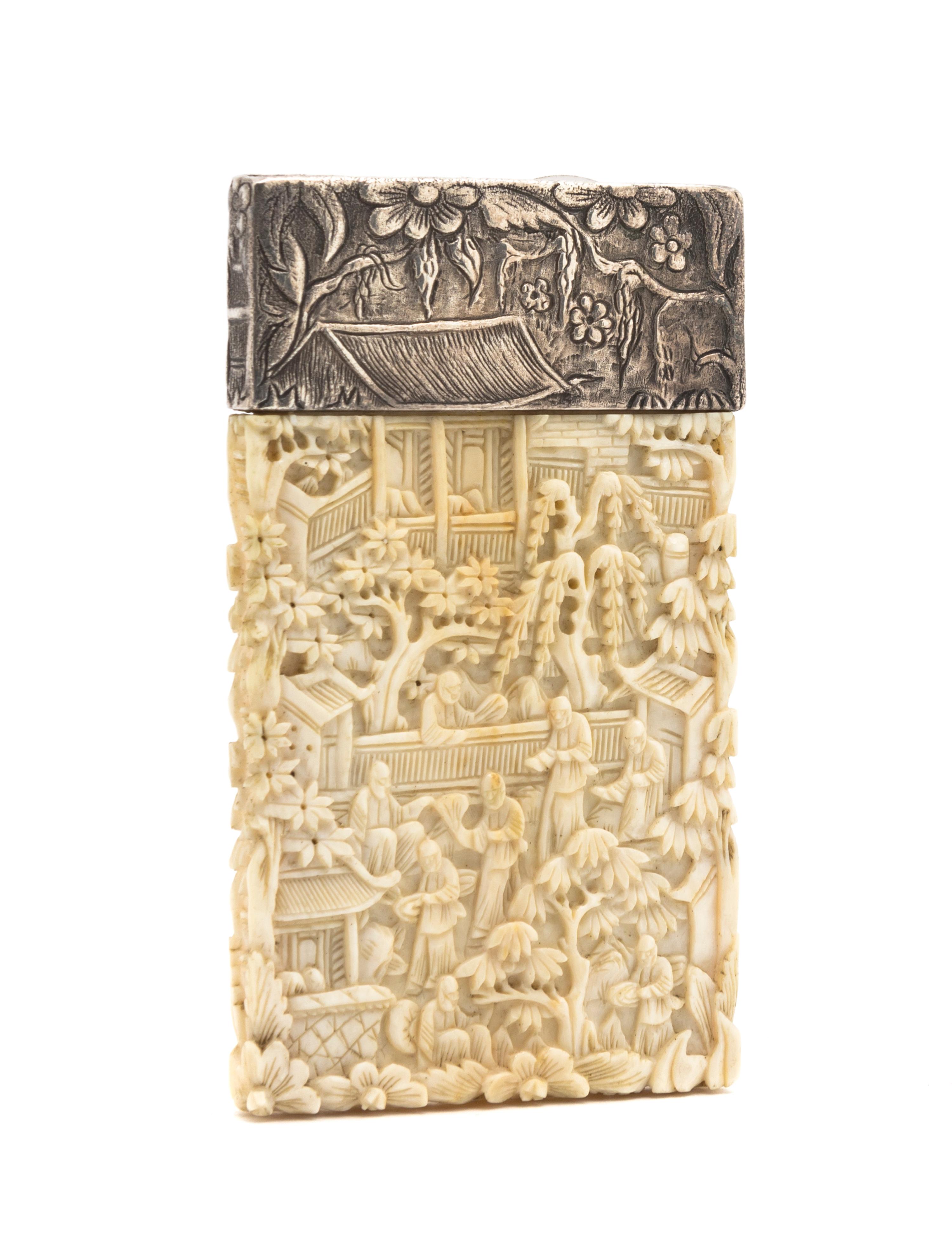An Asian Ivory and Silver Card Case, Height 3 3/4 inches.