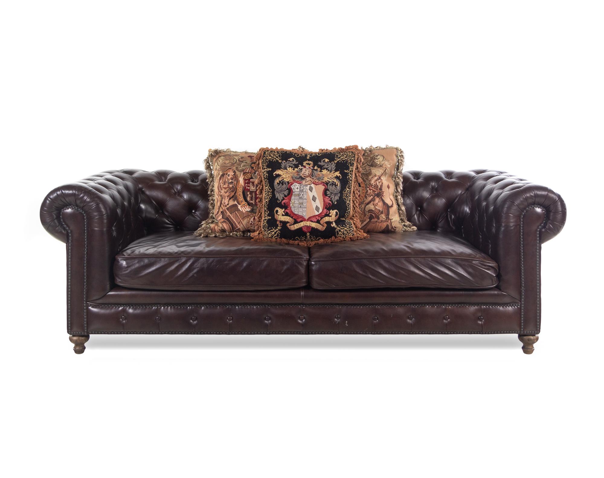 A Contemporary Tufted-Leather Upholstered Chesterfield Sofa