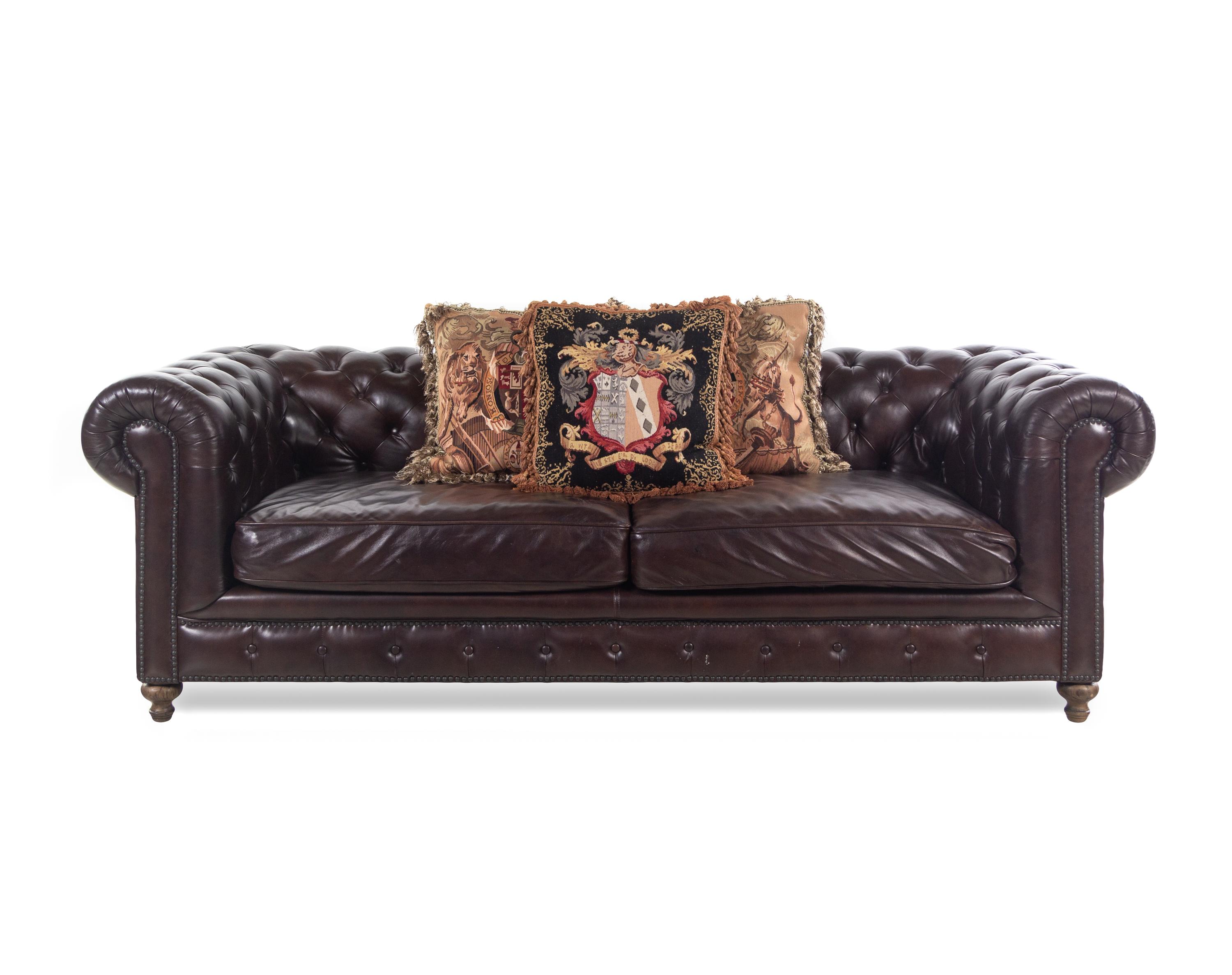 A Contemporary Tufted-Leather Upholstered Chesterfield Sofa