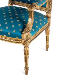 Two Napoleon III Giltwood Fauteuils