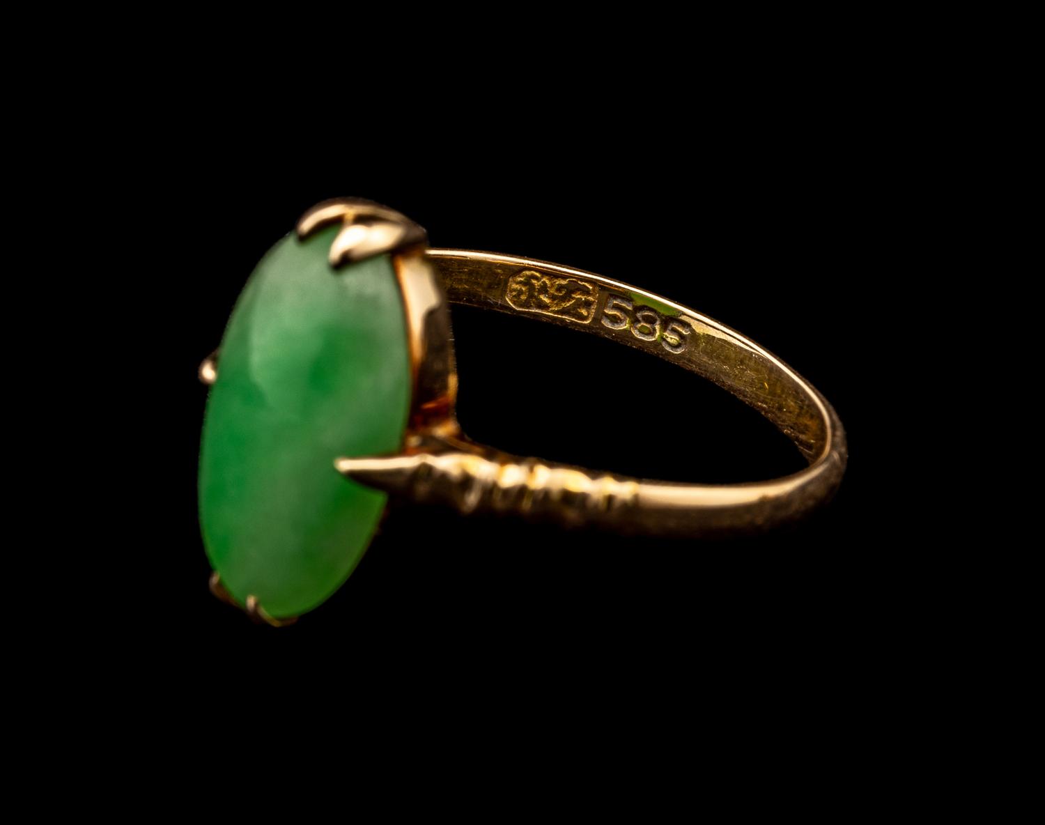 Three Chinese Apple Green Inset Gold Mounted Rings