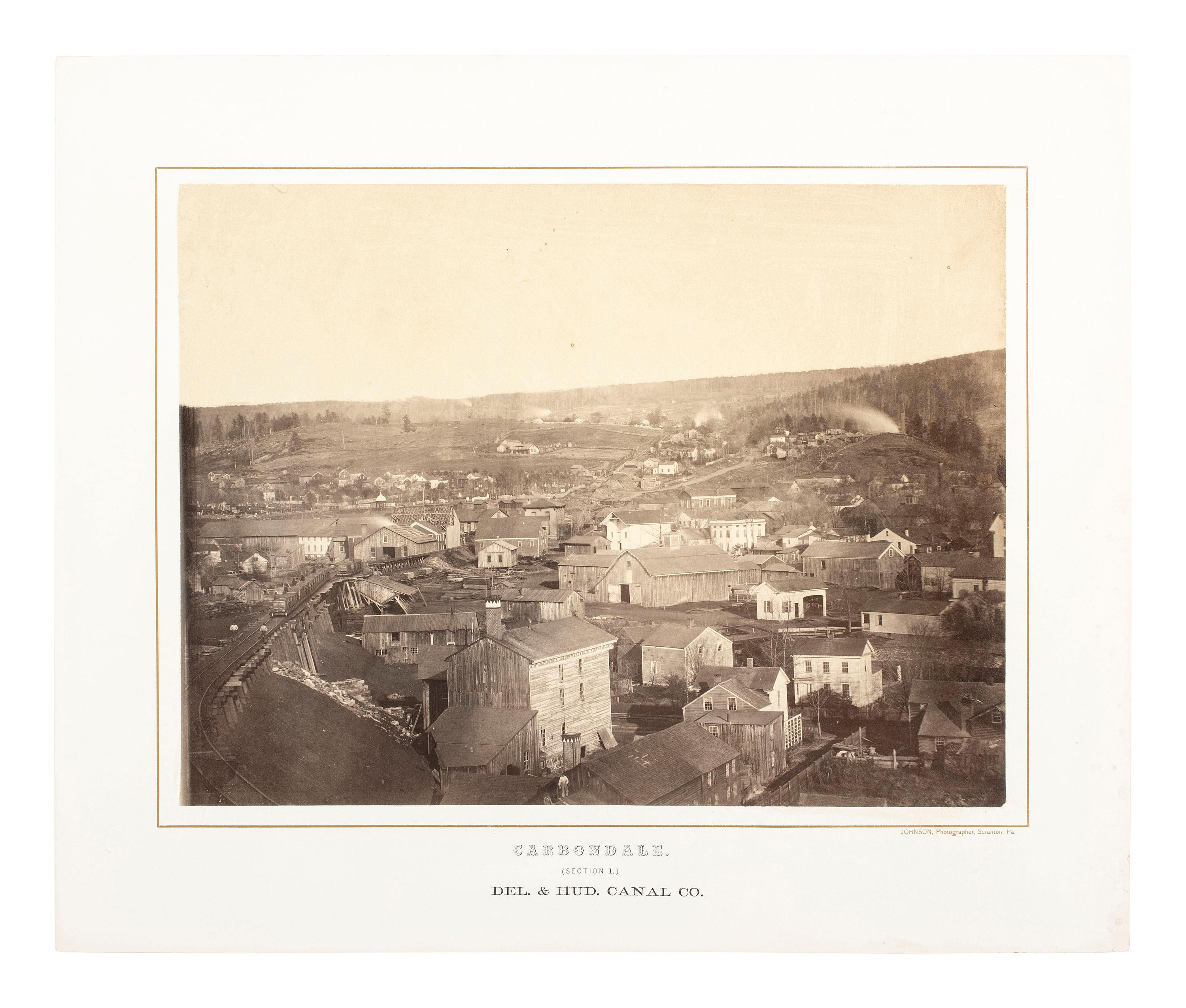 Pennsylvania JOHNSON, Thomas H. (b. 1821), photographer. Exceptional 3-section panoramic view of Carbondale, PA. Ca 1863-1865.