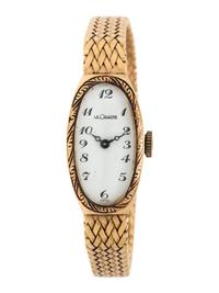 LeCOULTRE, 14K YELLOW GOLD WRISTWATCH