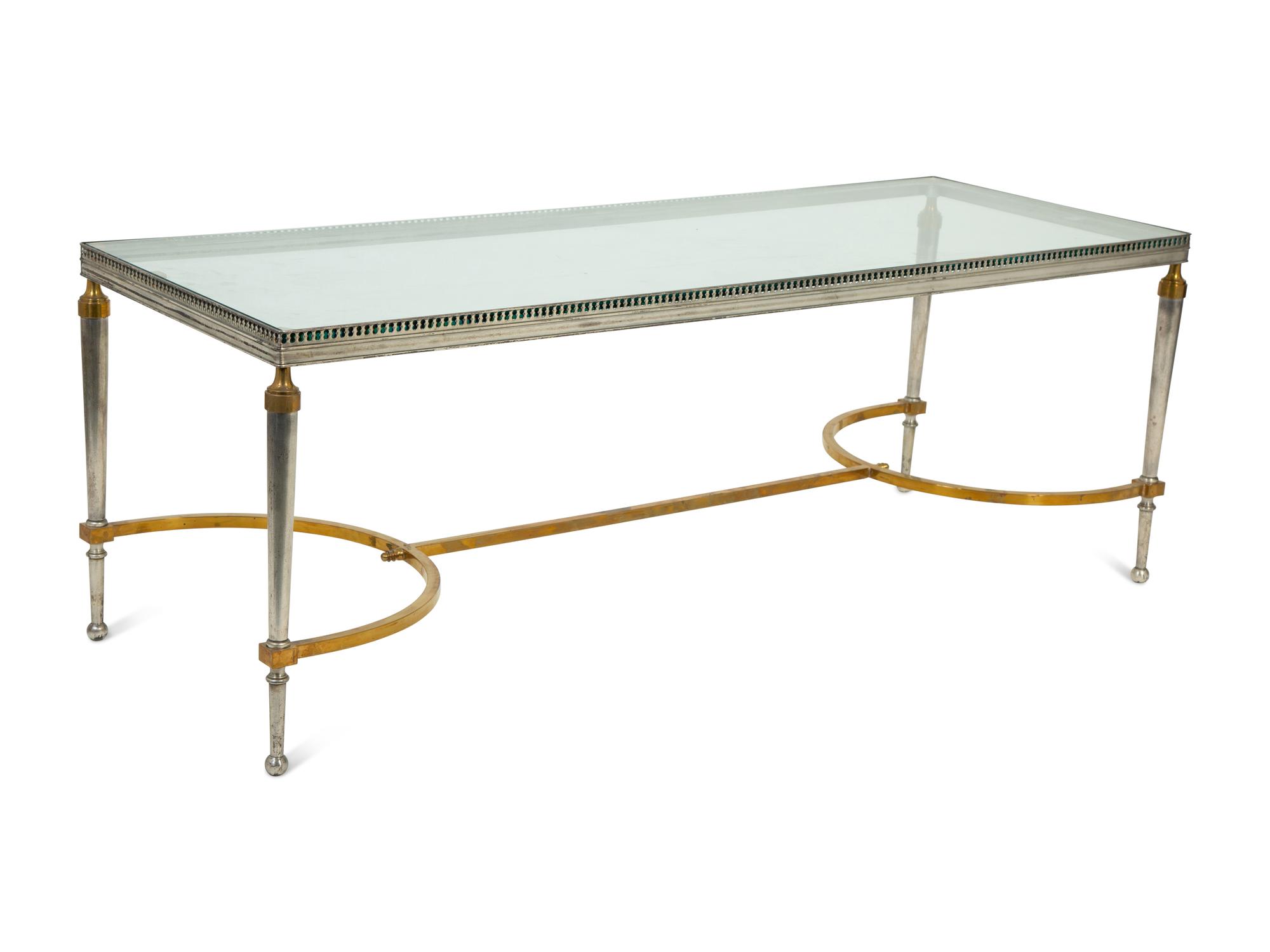 A Steel and Brass Low Table Attributed to Maison Jansen — 20TH CENTURY