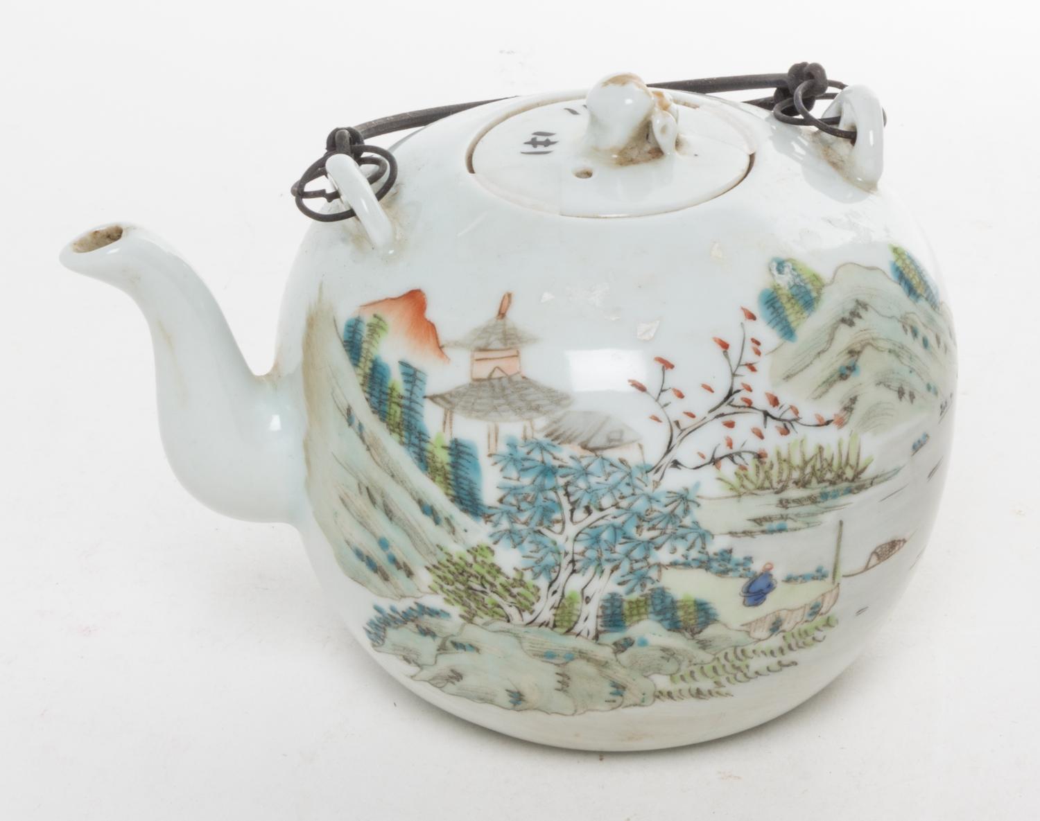 A Famille Rose Porcelain Teapot. Height 7 inches.
