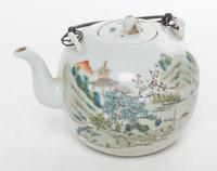 A Famille Rose Porcelain Teapot. Height 7 inches.