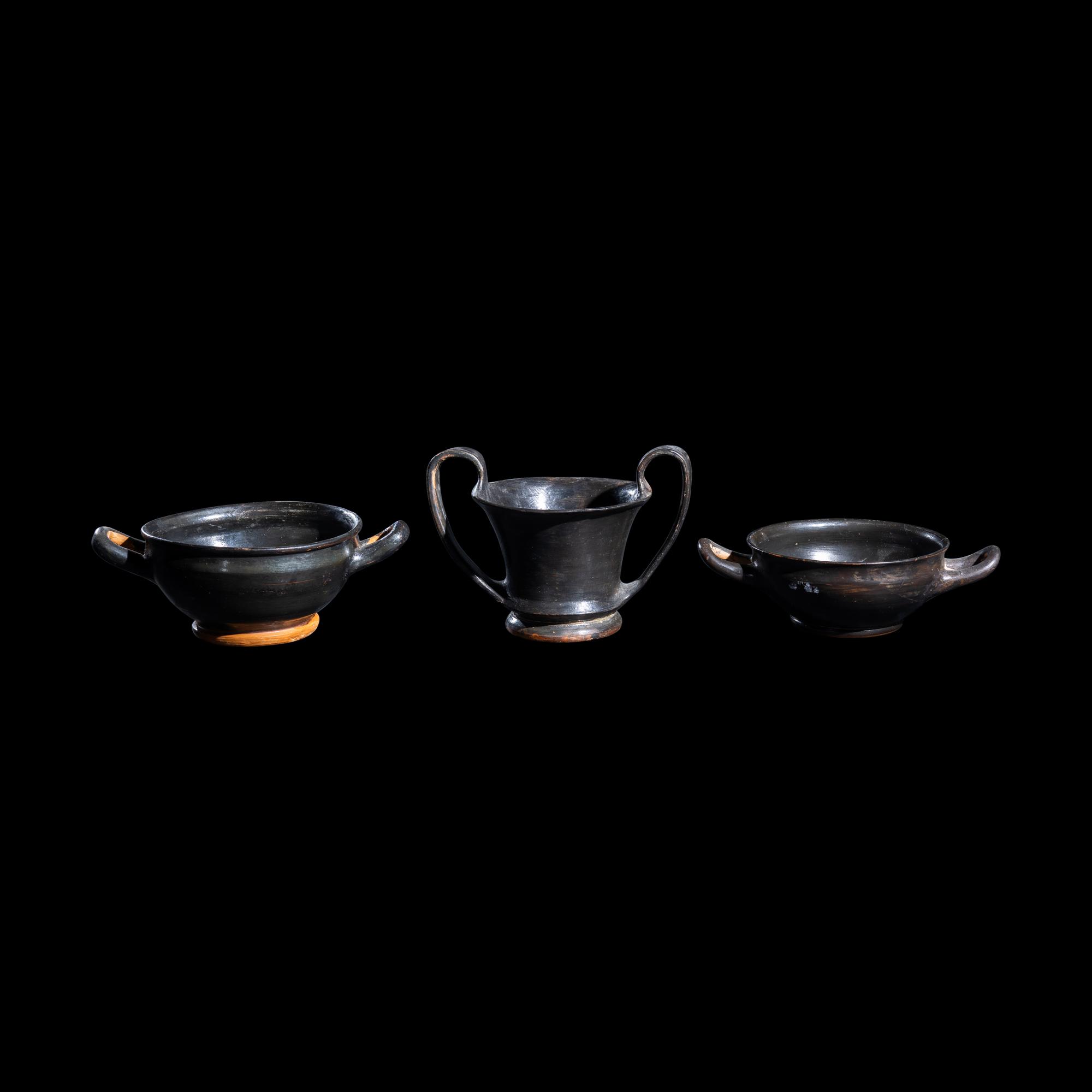 A Group of 7 Greek Black-Glazed Vessels