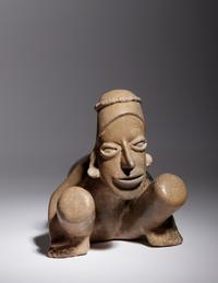 A Jalisco Pottery Crouching Figure