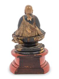A Japanese Lacquered Wood Figure of a Seated Monk
