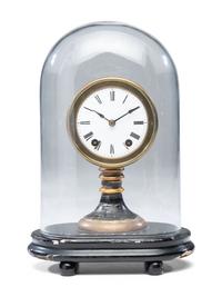 An Ebonized and Parcel Gilt Mantel Clock