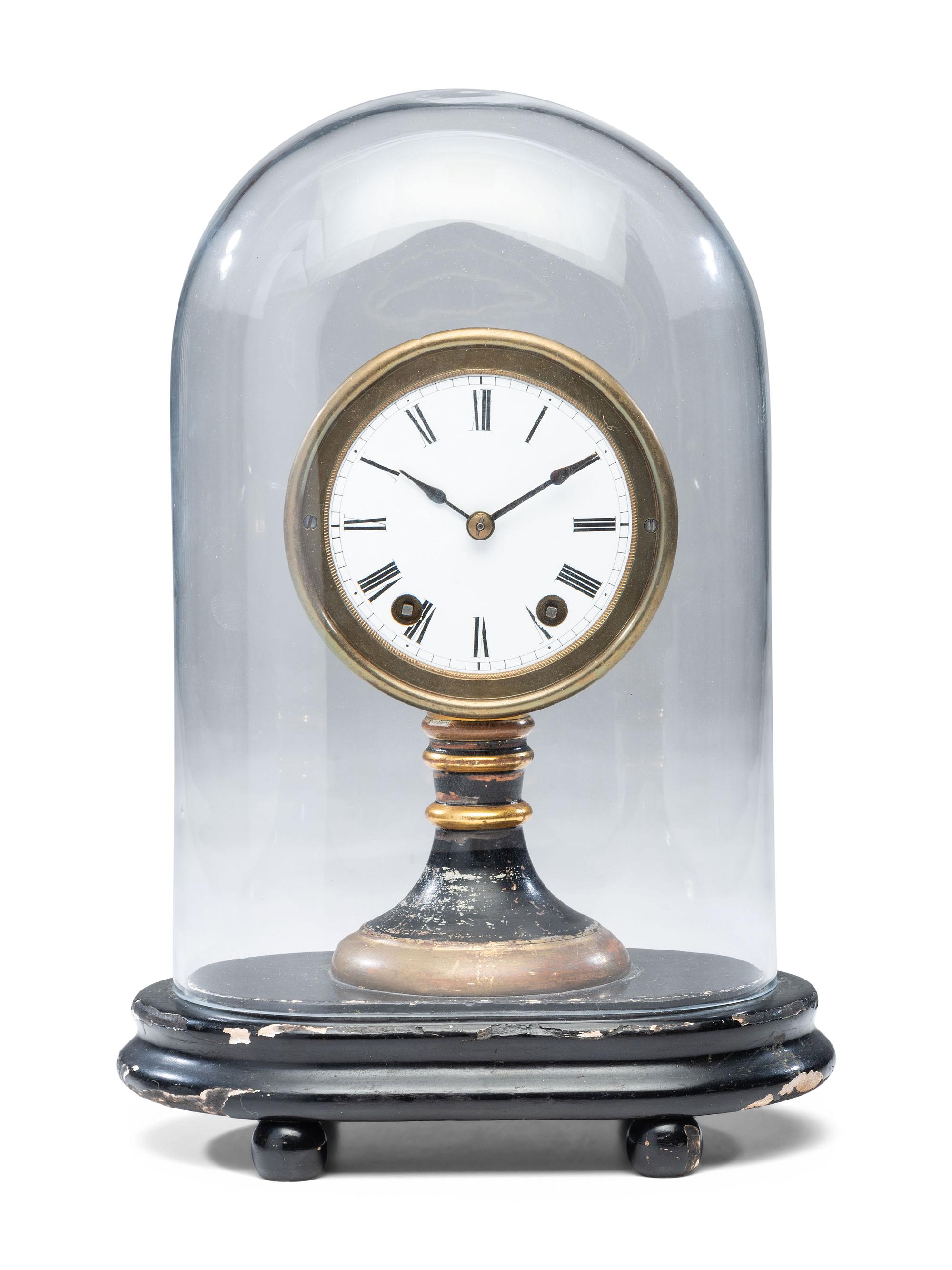An Ebonized and Parcel Gilt Mantel Clock