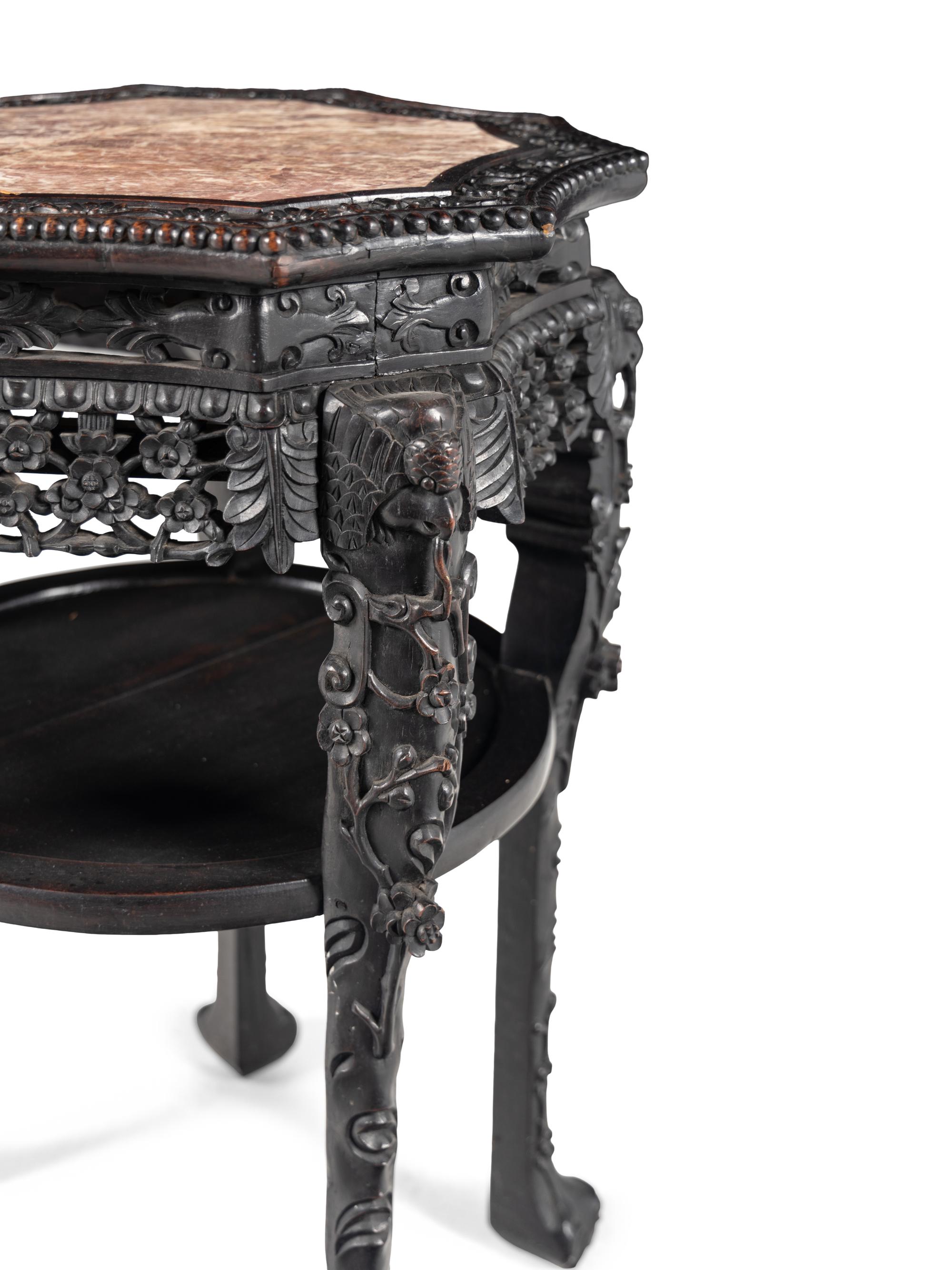 A Chinese Carved Hardwood Marble-Inset Side Table, 19th Century 清晚期 硬木嵌理石面花几